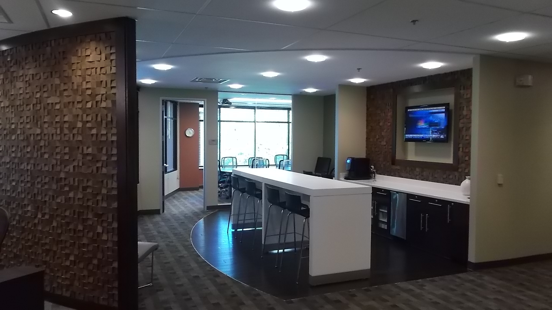 Business lounge, refresher bard, & large conference room (back) in Ste. 202