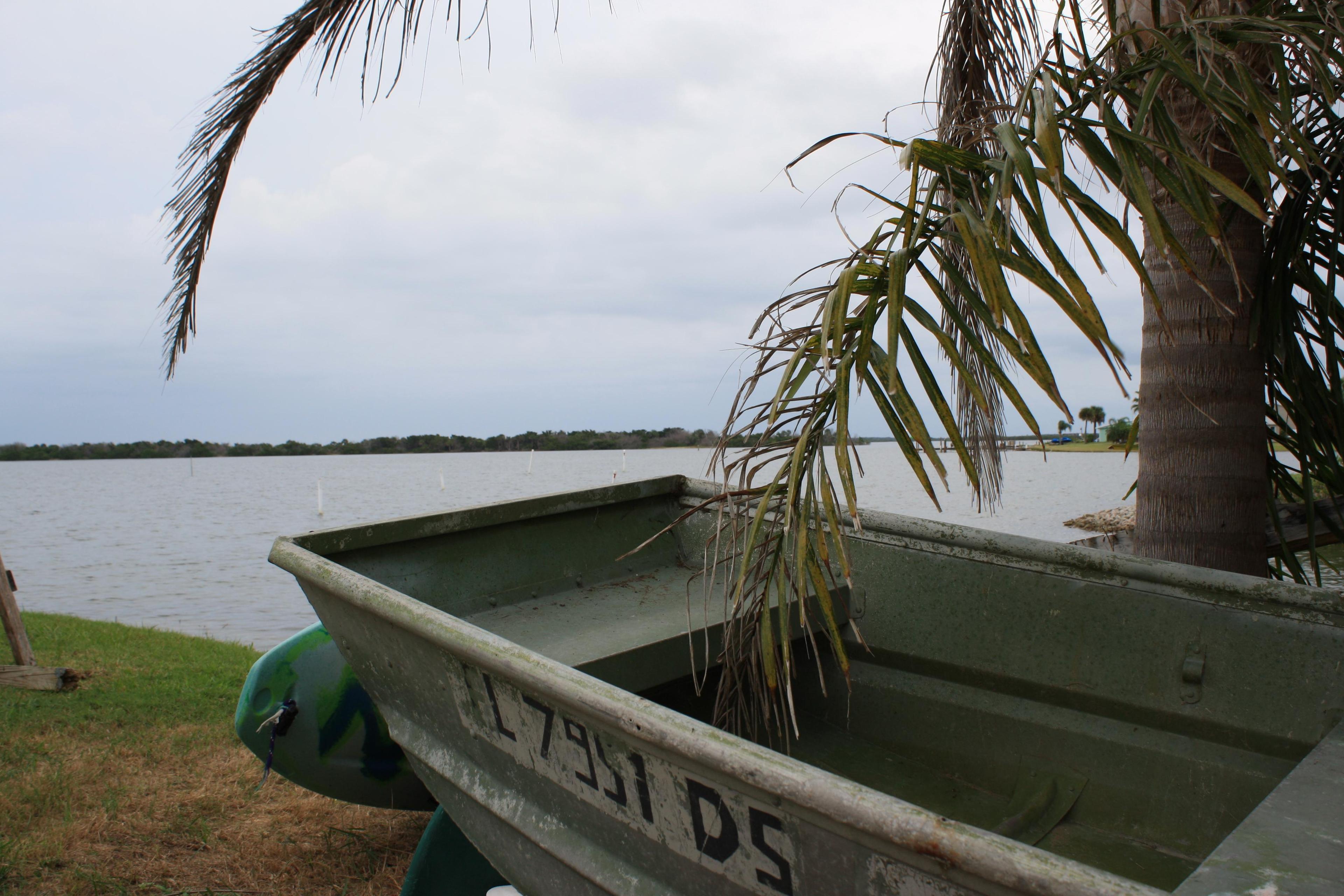 John Boat on the shore.