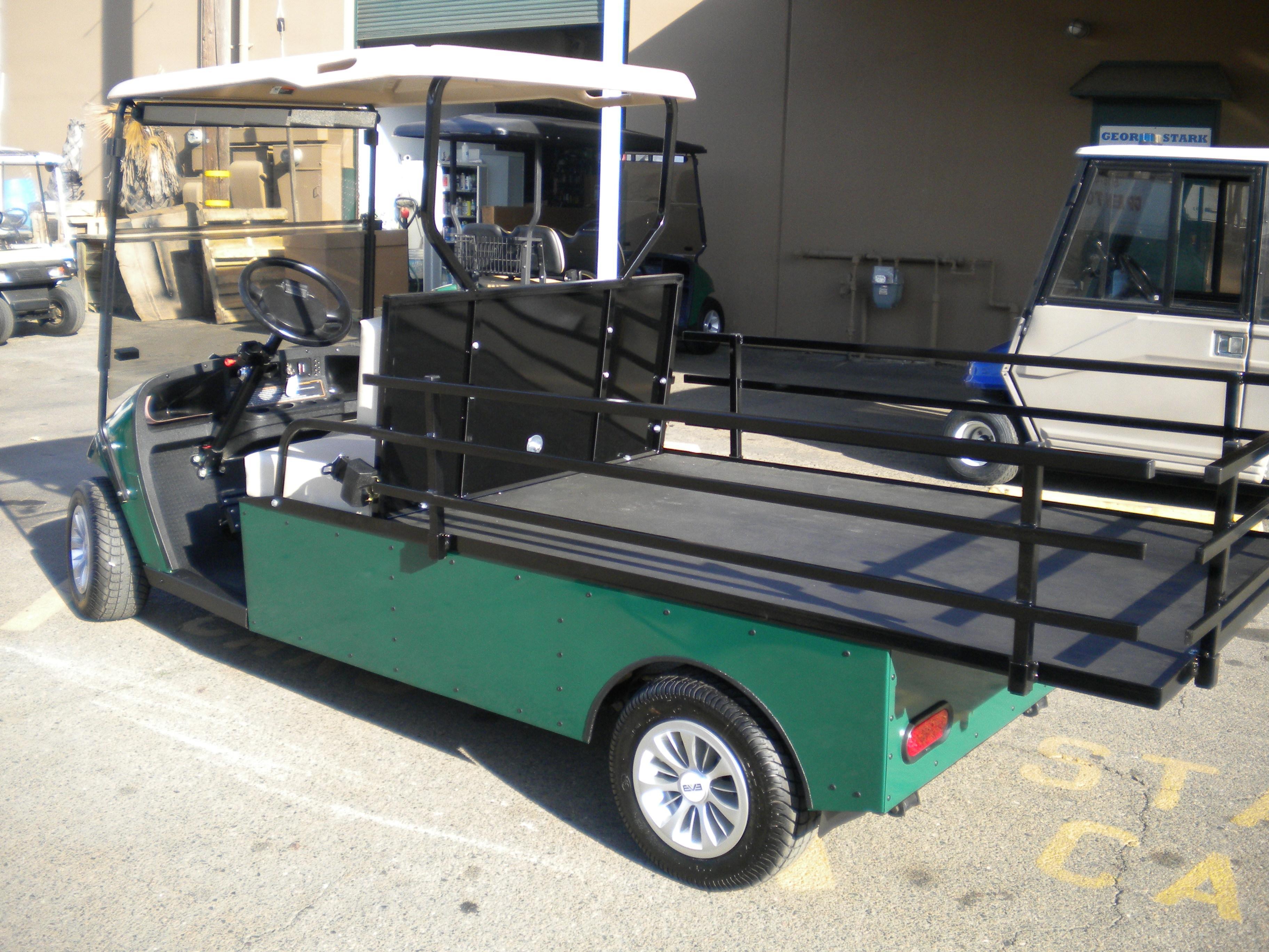 Custom made flatbed golf cart.