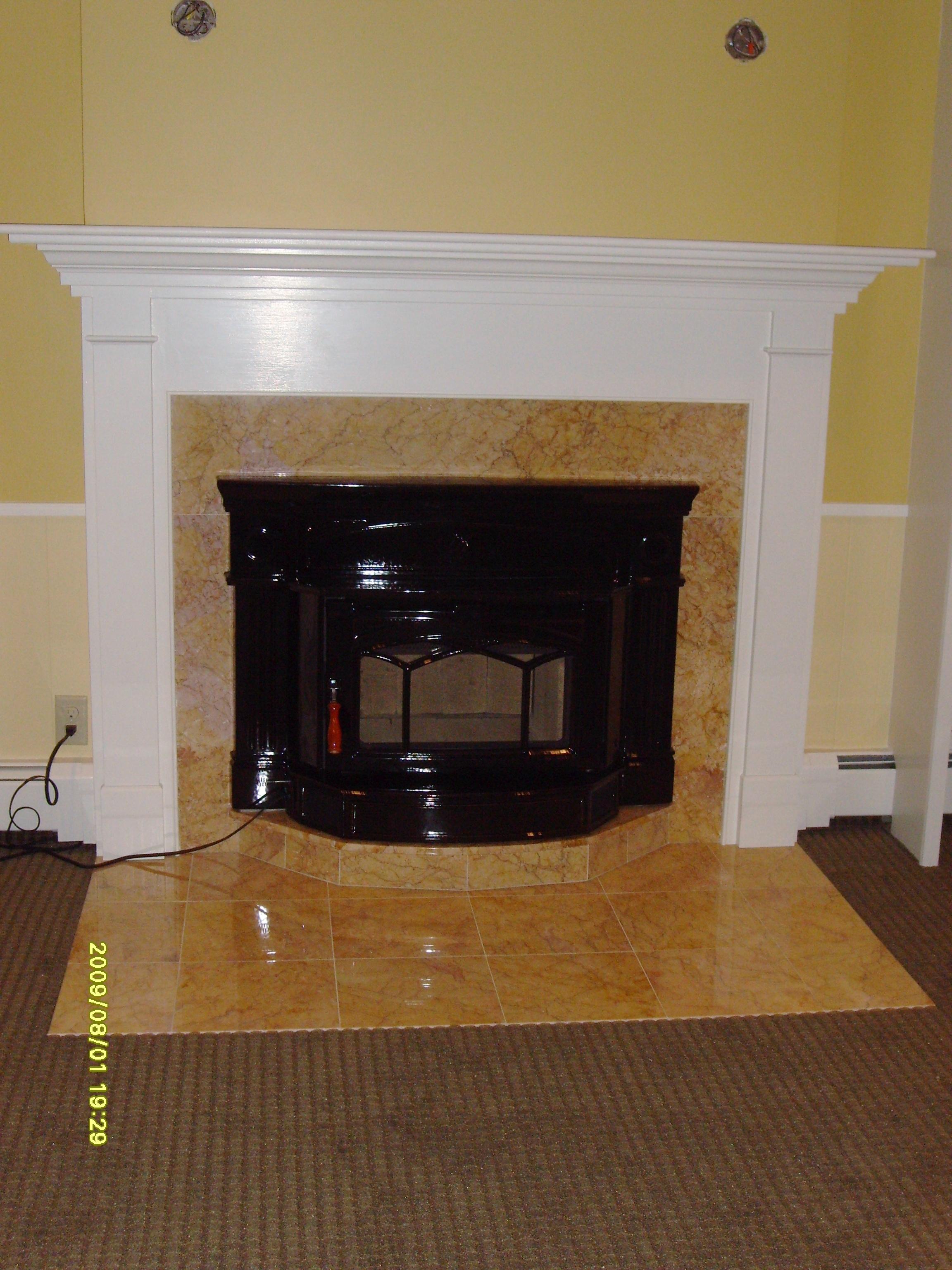 Black Enamel Woodstove with Marble surround