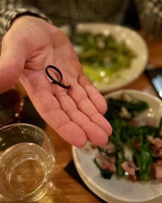 A side of rubber band in the broccolini