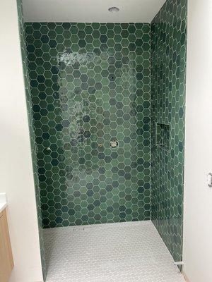 Geometric shapes and color variation with Wow Zellige Hex tile available in several colors! Emerald shown here.