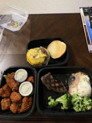 Cheeseburger (overcooked and cold) 8oz sirloin fatty and overcooked to feed a toddler and boneless wings that were decent but cold