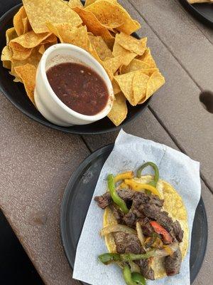 Chips and salsa ($7) and beef fajita taco ($6)