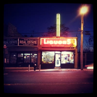 Midland Liquors. At night.