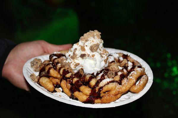 We got a classic funnel cake and a Reese's peanut butter cup funnel cake - both were sinfully delicious with their sweet batter.