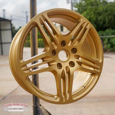 Porsche rim coated with Spanish gold