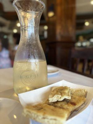 Pinot Grigio bottle (pour of two glasses) with their side of bread