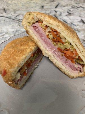 Muffuletta - Toasted bread but meat and cheese didn't seem warm. The olive, artichoke, and pepper topping was good.