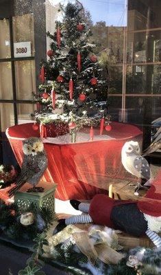 Christmas owls and gnomes greeting shoppers