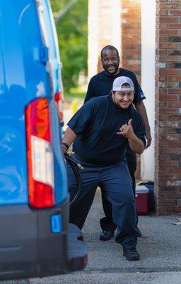 Caught Nick and Jason cheesing while loading up the truck for the day's install!