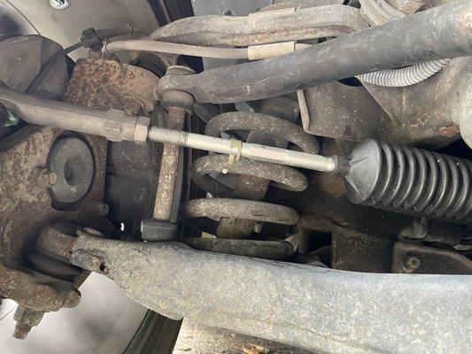 Broken tie rod boot clamp