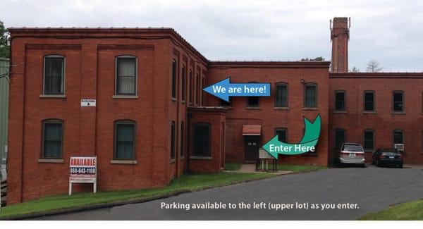 Enter at the door indicated by the green arrow. We are located on the second floor. Parking is available to the left as you e...