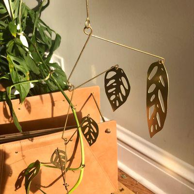 Monstera Adonsonii Mobile in brass from Natalie Joy