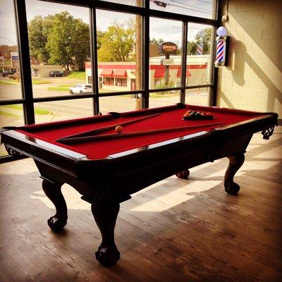 Pool table located inside.