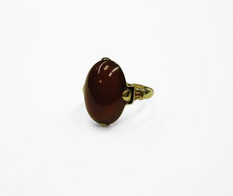 A Gorgeous Burgundy Carnelian is the focal point of this vintage 14kt Gold ring