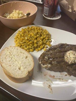 Sirloin steak, broccoli cheddar chowder over baked potato, corn and bread. Thursday night steak dinner