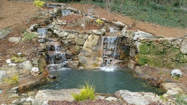 Our pond with 4 waterfalls constructed about 5 years ago! They truly age well. serenitywatergardens.com