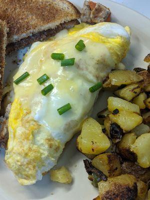 Three egg omelette, O'Brien potatoes, hot butter toast