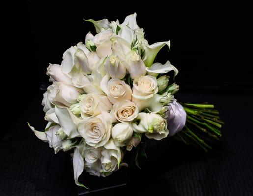 White Elegance Bridal Bouquet. Filled with Calla Lilies and Roses.