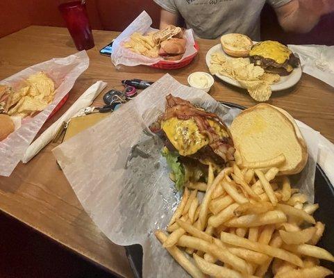 Double cheeseburger with bacon, French Fries, Laycoff's Original Grinder, chips, Italian grinder