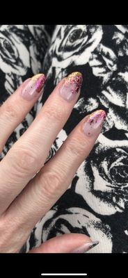 Iridescent foil nail design.