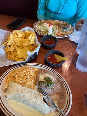 Foreground... steak burrito lunch special with an extra roasted jalapeño.  Farthest Lunch #9 chicken burrito, chili relleno.