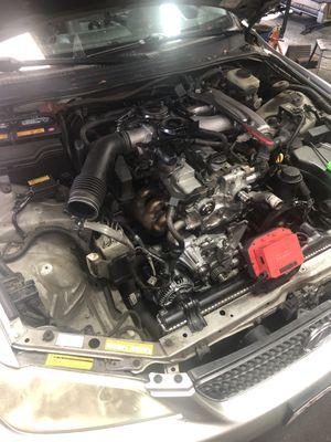 Lexus IS300 in some engine work including timing belt.