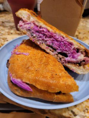 IL Pastrami   1/2 pound of sliced pastrami with whole grain mustard, red cabbage, mustard sauce, and fontina cheese, on ciabatta.