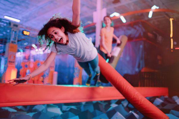 Urban Air Battle Beam - Battle your friends, loser falls into a foam pit!