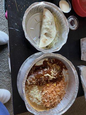 Speedy Gonzales lunch special.  Soft beef taco, beef enchilada, rice, and beans.