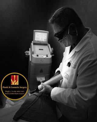 Dr. Vu using Spectrum Erbium YAG laser.