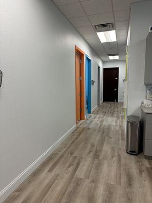 Hallway with color coded doors