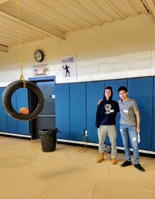 staff guys at basketball in a tire game