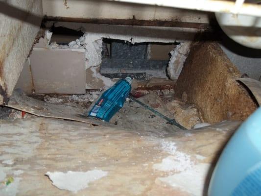 Severe Water Damage Found Within Bathroom Cabinetry