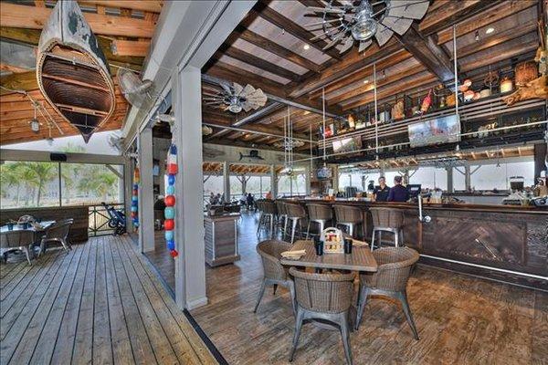 Over looks the water - best restaurant bar out there and all part of the HOA