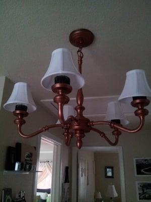 Chandelier rehab. New paint, light bulbs, and covers, all under $80. Awesomeness.