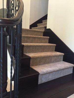 We added a light colored carpet runner to accent the new Black Forest staircase for a contrasting effect