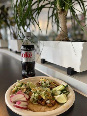 Tacos al Pastor and a bunch of veggies from the toppings bar.