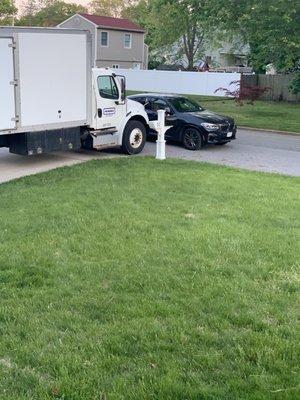 We had to block them in so they wouldn't drive off with our belongings. As a result, the foreman's son, yelled out "Move your f#$&@ing car!