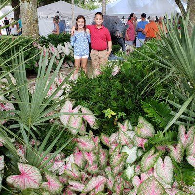 The Lewis twins of Vero Beach - William and Rebecca - enjoying the Caladium Festival in Lake Placid, Florida.