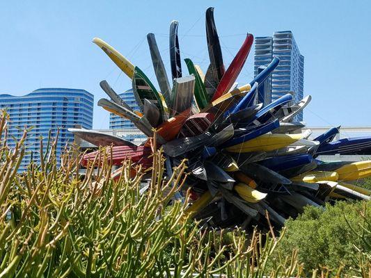 A tree of canoes and boats grows out of the bushes. Actually this is a zoom in view of the Big Edge at City Center from the Aria.