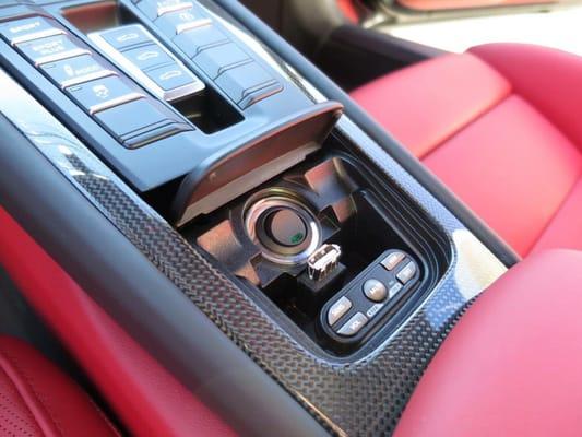 Laser jammer kill switch and radar detector control center installed in former ashtray area.