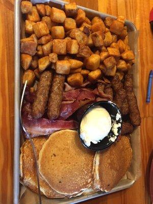 Unlimited Bfast: Hash browns, sausage links, bacon, whipped butter and pancakes!