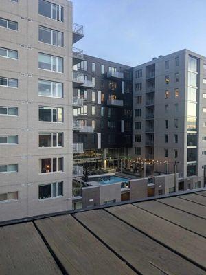 View of the neighboring apartment. Nobody in the pool on a 45 degree evening, weird :)