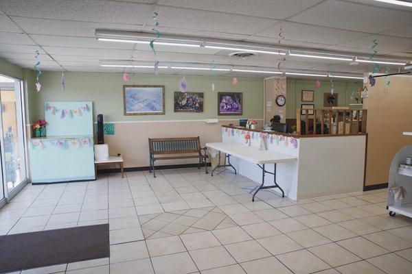 The clean, spacious waiting waiting room at the clinic includes a photo booth for pets.