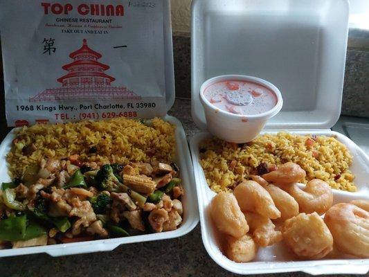 Hunan Chicken and Sweet and Sour Shrimp.  Hugh lunch portions.