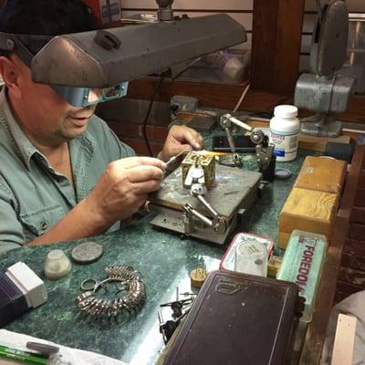 Mr. Murillo soldering my ring back together to resize it.