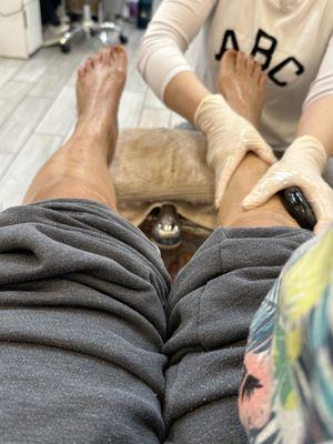 Relaxing spa pedi with hot stone massage