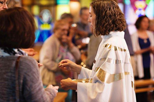 We gather around the table to share communion every Sunday. All are welcome to receive.